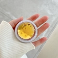 Macro detail of a yellow rhinestone phone grip with faceted gem held by a person - Magnetic Large Rhinestone-Yellow