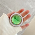 Detailed view of an emerald green rhinestone magnetic pop-socket on a white phone holder - Magnetic Large Rhinestone-Green