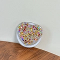 Vista dettagliata di un supporto per telefono a cuore con glitter colorati vivaci - Cuore di Paillettes Magnetico n. 4