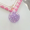 Macro detail of purple resin button phone grip with cloud accents and glitter finish - Adhesive Large Button Cloud Pearlescent / Purple