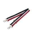 Close-up of adjustable striped nylon shoulder strap with premium gold metal hardware hooks - Blue White Red