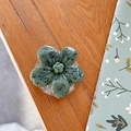 Macro view of dark green floral phone grip with black spots and transparent base - Cherry Blossom Socket - Ink Style - Dark Green