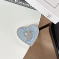 Detail of light blue heart phone grip with rhinestones and a mirror featuring mine text - Adhesive - Blue