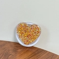 Detail of heart-shaped phone grip with gold glitter and butterfly sequins inside - Magnetic Sequin Heart No. 15