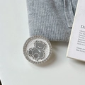 Detailed close-up of a magnetic phone grip featuring a crystal-encrusted gray bear mirror - Transparent Stand Style / White