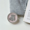 Macro detail of a rhinestone-encrusted bear phone socket with pink leather texture - Transparent Stand Style / Pink
