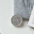 Detailed macro view of a silver magnetic phone grip with a rhinestone-studded bear mirror - Transparent Stand Style / Silver