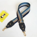 Detail of adjustable striped bag strap with premium leather ends and gold metal hooks - Blue Pattern + Black