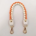 Detailed view of hand-woven orange and white strap with golden hardware and leather ends - 1.5cm Wide / Orange Short