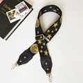 Adjustable wide black canvas bag strap with gold star pattern and metal snap hooks - Stars with Black Leather