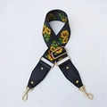 Detail of adjustable sunflower patterned bag strap with golden rivets and hardware - Sunflower
