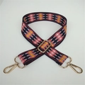 Detailed view of adjustable ethnic geometric pattern shoulder strap with gold metal hooks - No. 8 Contrast Black Coffee Ribbon