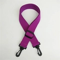 Detail of purple canvas bag strap featuring black plastic buckle and swivel hooks - Purple