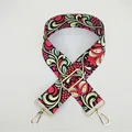 Detail of adjustable bag strap with vine pattern and golden swivel metal hooks - Ivy