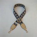 Detail of adjustable oblique jacquard wide shoulder strap with gold metal hooks - Khaki