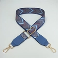 Detail of adjustable woven wide shoulder strap with blue geometric jacquard and gold hooks - No.4 Blue Pattern + Lake Blue Leather Trim