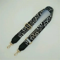 Adjustable black and white geometric woven strap with gold metal buckles for handbags - Black and White Checkered + Black Leather