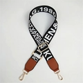 Detail of adjustable woven bag strap with letter patterns and brown leather ends - Brown