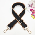 Detail of adjustable black nylon bag strap with brown stitching and gold metal hooks - Gold Buckle / 1-Black with Brown Edge