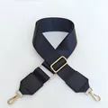 Adjustable black nylon shoulder strap with gold metal hooks and leather reinforcement - Style B