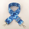 Detail view of ethnic blue chevron woven bag strap with adjustable gold lobster clasps - US 2