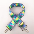 Close-up of adjustable ethnic style wide bag strap with colorful diamond patterns - US 9