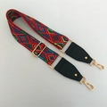 Close-up of ethnic woven bag strap with colorful geometric patterns and gold metal clips - Geometric Rhombus