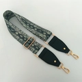 Detail of adjustable wide guitar strap with grey snake print and gold metal hooks - Snake Print