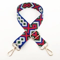 Detail of adjustable colorful woven strap with ethnic geometric patterns and gold metal clips - Green Red Blue / Silver Clasp