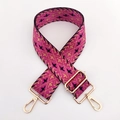 Detail of colorful geometric embroidery on wide adjustable shoulder strap with gold hardware - Violet