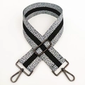 Detail of 5cm wide gray polka dot strap with gunmetal buckles and adjustable length - Grey With Gunmetal Buckle