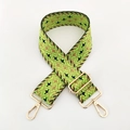 Detail of wide jacquard nylon bag strap with green geometric pattern and gold swivel hooks - Silver Clasp / Fluorescent Green