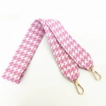 Macro detail of pink houndstooth cotton bag strap with premium gold alloy swivel hooks - Deep Pink