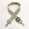 Detail of wide striped canvas shoulder strap with dark grey metal rotating hooks - Rice Green Gunmetal Buckle