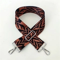 Macro detail of brown and black geometric woven strap with silver metal swivel hooks - Black Brown Pattern Silver Buckle