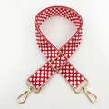 Detail of red jacquard embroidered guitar strap with white floral pattern and gold hardware - Silver Buckle/Geometric / B-Style Red