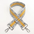 Detail of adjustable wide bag strap with yellow stripes and black pixel pattern hardware - Yellow White Silver Buckle