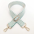 Detail of green star pattern jacquard strap with gold metal buckles and swivel hooks - Silver Buckle/Cross Woven / Style A Green