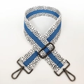 Detail of wide woven strap with black, white and blue pattern and gunmetal buckle - Blue White Gunmetal Buckle