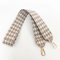 Detail of retro houndstooth pattern shoulder strap with premium gold metal clasps - Khaki