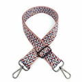 Detail of colorful woven jacquard strap with V-shaped wave pattern and metal swivel hook - Gunmetal Buckle / Bean Paste Brown