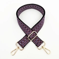Detail of adjustable woven jacquard strap with red and blue chevron pattern and gold metal hooks - Gold Buckle / Black Wine Red