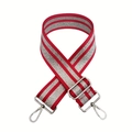 Macro detail of red woven strap with silver glitter stripes and silver metal swivel hooks - Red Silver Buckle
