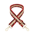 Detailed view of red leopard print bag strap with gold tinsel and luxury hardware - Orange Red Gold Buckle