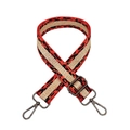 Close-up of adjustable leopard print bag strap with gold glitter and gunmetal hardware - Orange Red Gunmetal Buckle