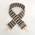 Close-up of adjustable houndstooth wide strap with gold metal hardware and snap hooks - Beige Coffee