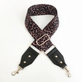 Detail of leopard print wide bag strap with gold lobster clasps and leather ends - Coffee Leopard