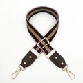 Close-up of tricolor woven wide shoulder strap with golden lobster clasps and rivets - Pink Coffee + Coffee Leather