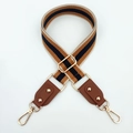 Adjustable brown and black striped woven strap with gold metal hooks and leather trim - Khaki + Brown Leather