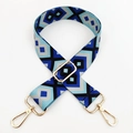Close-up of ethnic geometric embroidered bag strap with golden metal swivel hooks - Royal Blue Black